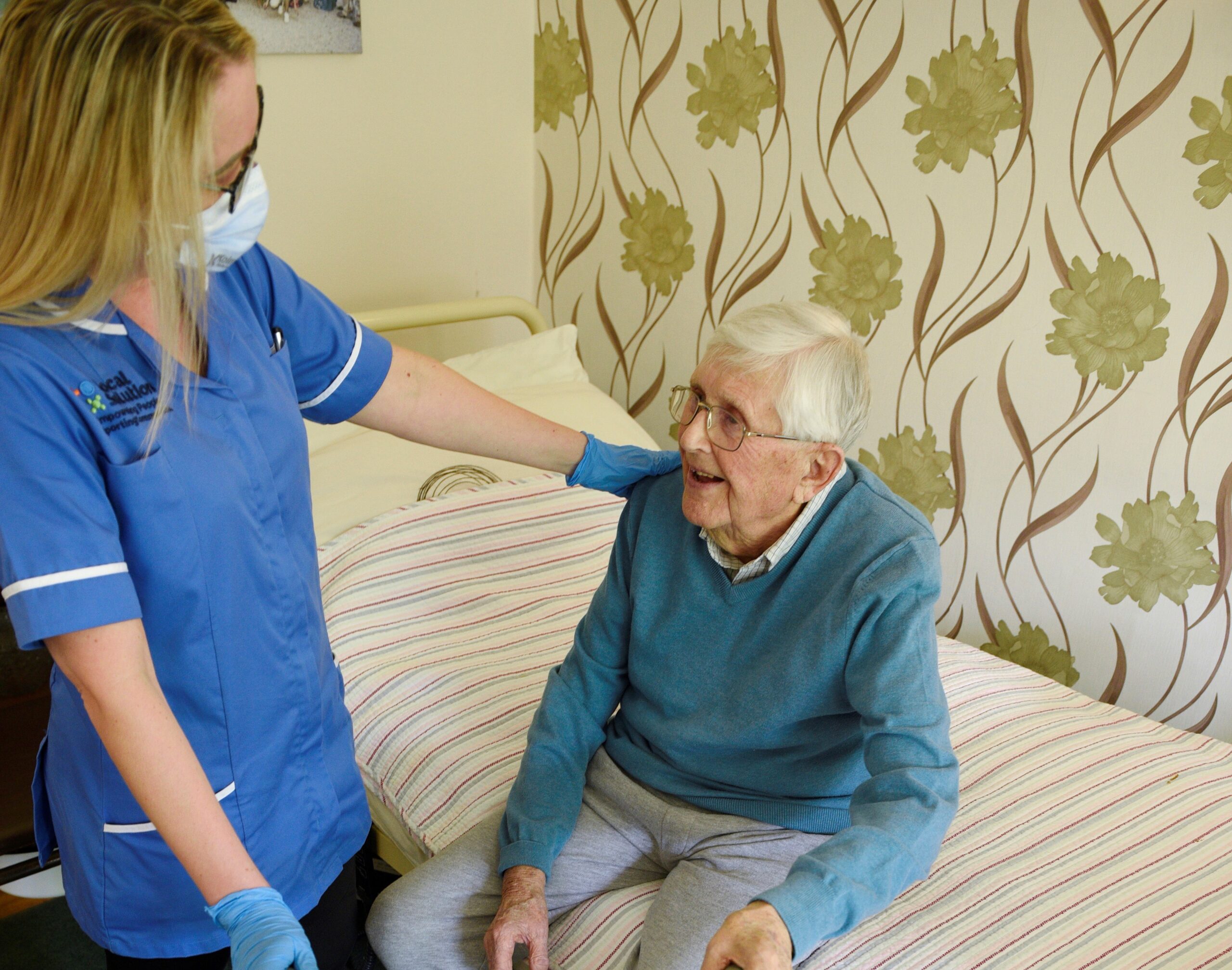 A Local Solutions carer supporting someone at home